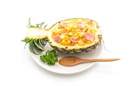 pineapple fried rice with ham isolated on white backgroundの写真素材