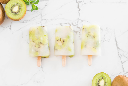 homemade kiwi ice-cream on plateの写真素材