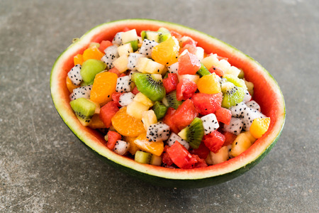 mix sliced fruits (orange, dragon fruit, watermelon, pineapple, kiwi)の写真素材