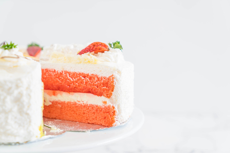 different pieces of cake on cake standの写真素材