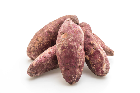 fresh sweet potato isolated on white backgroundの写真素材