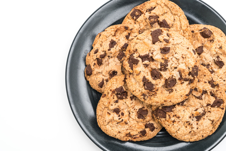 cookies with dark chocolate chips isolated on white backgroundの写真素材