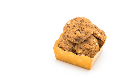 chocolate chips and cashew nut cookies isolated on white backgroundの写真素材