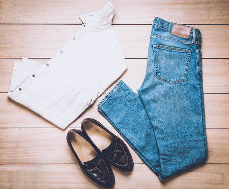 Clothing for men on the wooden background - vintage effect filterの写真素材