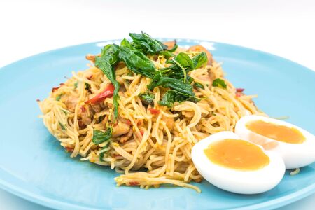 fried noodle with chicken and basil - Asian food styleの写真素材