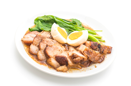Stewed pork leg with egg and vegetable isolated on white backgroundの写真素材