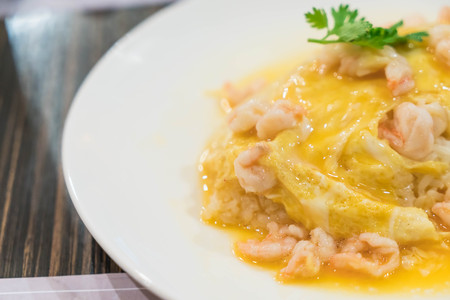 creamy omelet with shrimp on rice