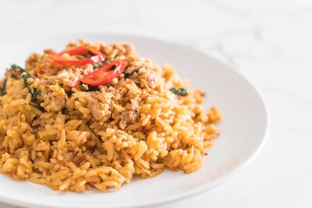 spicy fried rice with pork and basil - Thai food styleの写真素材