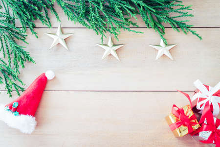 christmas tree with christmas decoration on wood background - vintage effect filterの写真素材