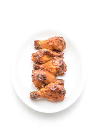 barbecue chicken wings isolated on white backgroundの写真素材