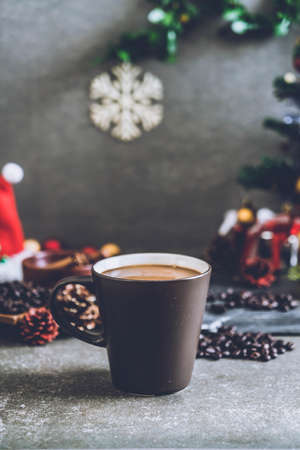 hot coffee cup with christmas decoration - vintage effect filterの写真素材