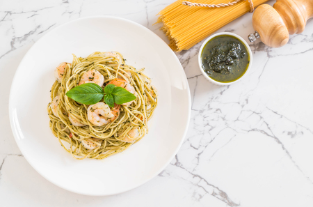 pasta spaghetti with pesto green and shrimps - Italian food styleの写真素材