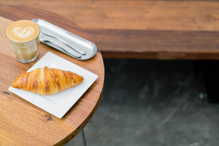 croissant with hot coffee for breakfastの写真素材