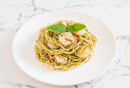 pasta spaghetti with pesto green and shrimps - Italian food styleの写真素材