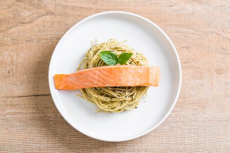 pasta spaghetti with pesto green and salmon - Italian food styleの写真素材