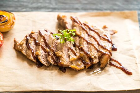 grilled pork steak with BBQ sauce