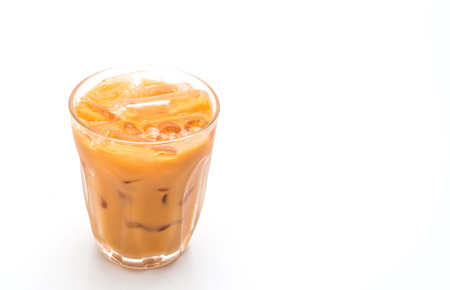 thai milk tea isolated on white backgroundの写真素材