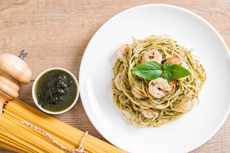 pasta spaghetti with pesto green and shrimps - Italian food styleの写真素材