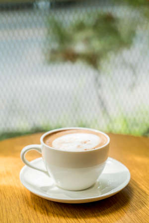hot coffee cup in cafeの写真素材