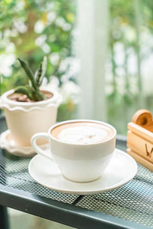 hot coffee cup in cafeの写真素材