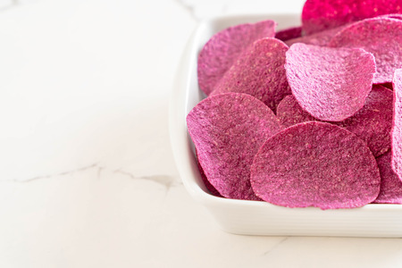 sweet potato chips on tableの写真素材