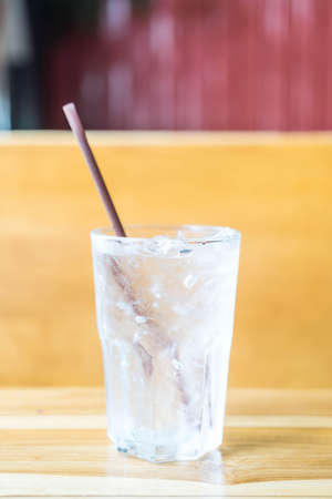 a glass of water with icedの写真素材