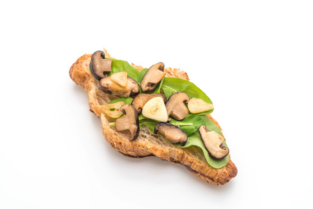 mushroom croissant sandwich - healthy or vegan food style - isolated on white backgroundの写真素材