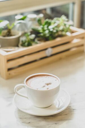 hot coffee cup in cafeの写真素材