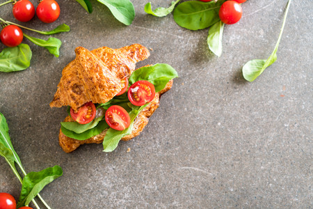 tomatoes croissant sandwich - healthy or vegan food styleの写真素材
