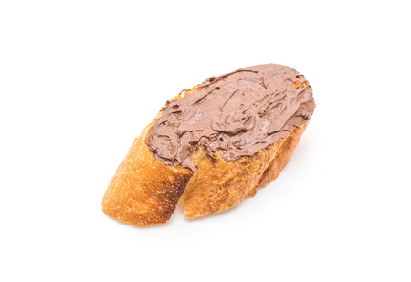bread with chocolate hazelnut spread isolated on white backgroundの写真素材