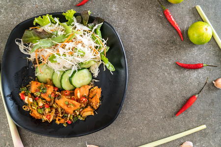 fried salmon spicy salad - Fusion food styleの写真素材