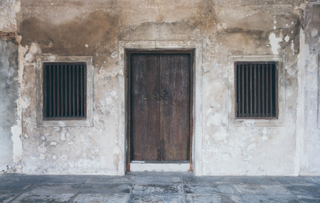 old and vintage window on grungy wallの写真素材