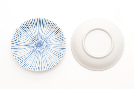 plate in old style isolated on white backgroundの写真素材