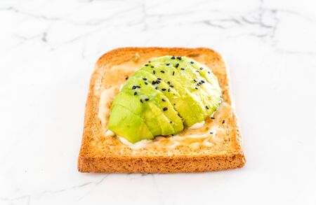 wholewheat bread toast with avocado - vegan or healthy food style