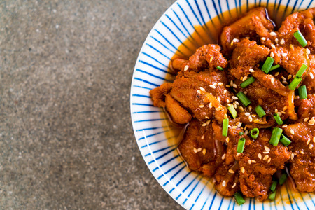 fried pork with spicy korean sauce (bulgogi) - korean food styleの写真素材