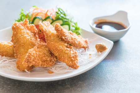 fried fish with tonkatsu sauce - japanese food styleの写真素材