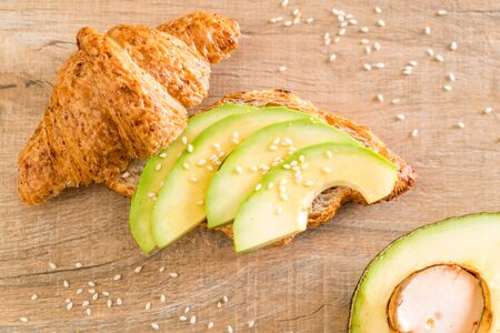 avocado croissant sandwich - healthy or vegan food style