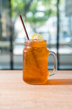 iced lemon tea jar in cafeの写真素材
