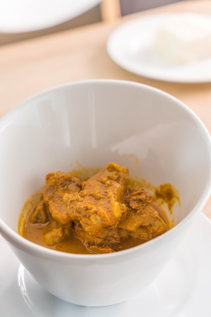 Curry pork bones in bowlの写真素材
