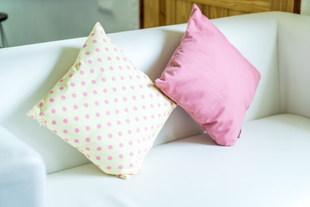 comfort pastel pillow on sofaの写真素材