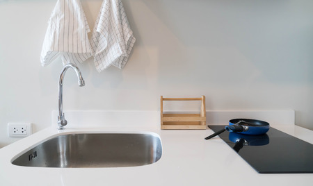 Modern kitchen sink in a roomの写真素材