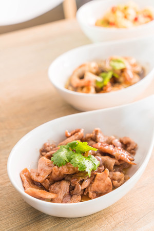 Stir Fried Pork with Shrimp Paste on plateの写真素材