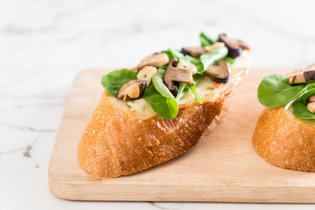 bread with rocket and shiitake mushroom - healthy or vegan food style