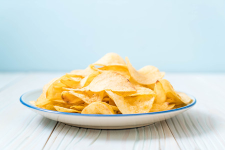 potato chips on plate - unhealthy foodの写真素材