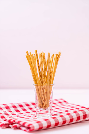 biscuit sticks on wood backgroundの写真素材