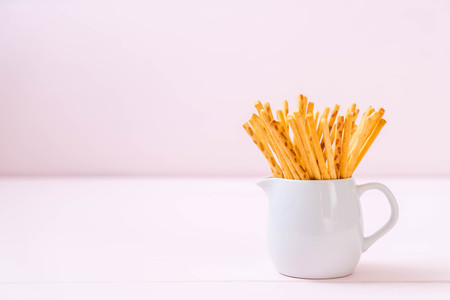 biscuit sticks on wood background