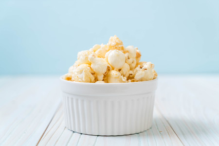 sweet popcorn on wood backgroundの写真素材