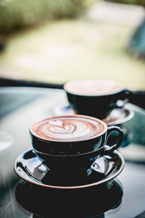 hot chocolate cup in coffee shop - vintage filterの写真素材