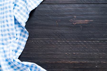 kitchen cloth (napkin) on wood background with copy space