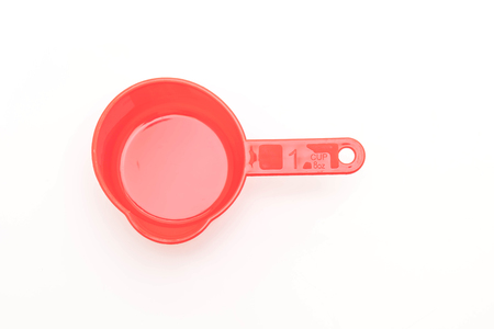 measuring cup isolated on white backgroundの写真素材